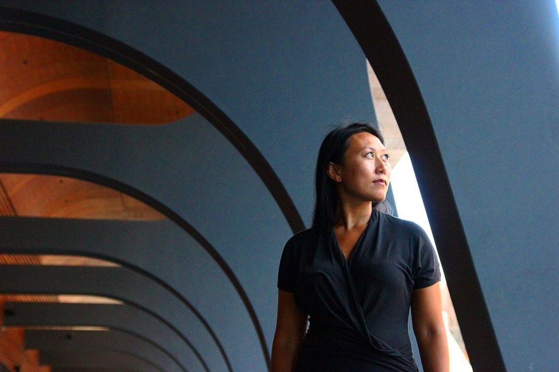 Concentric architectural arches, echoing the Zenter mark